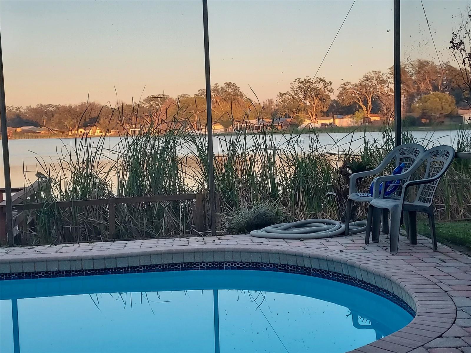 Screened Lanai & Pool at Sunset