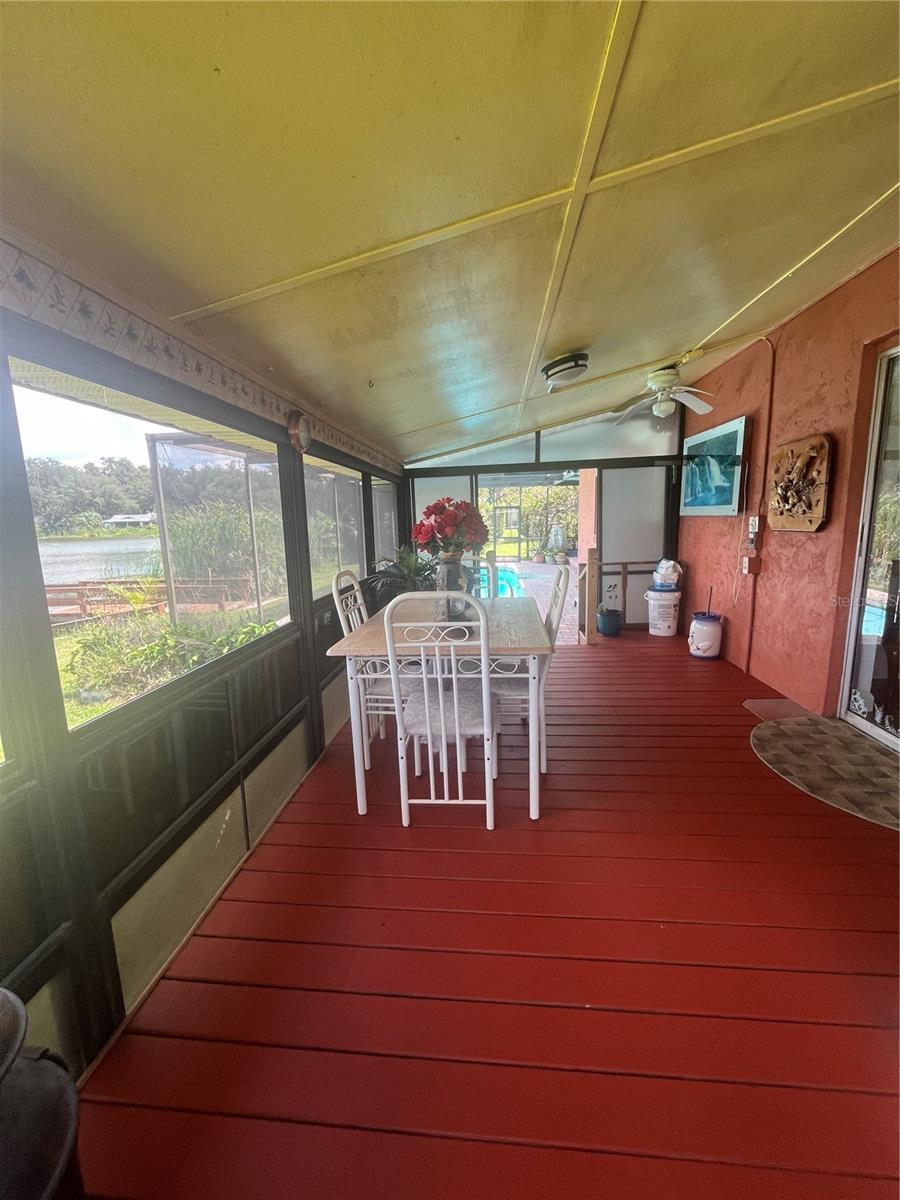 19 X10 Porch leading to Pool