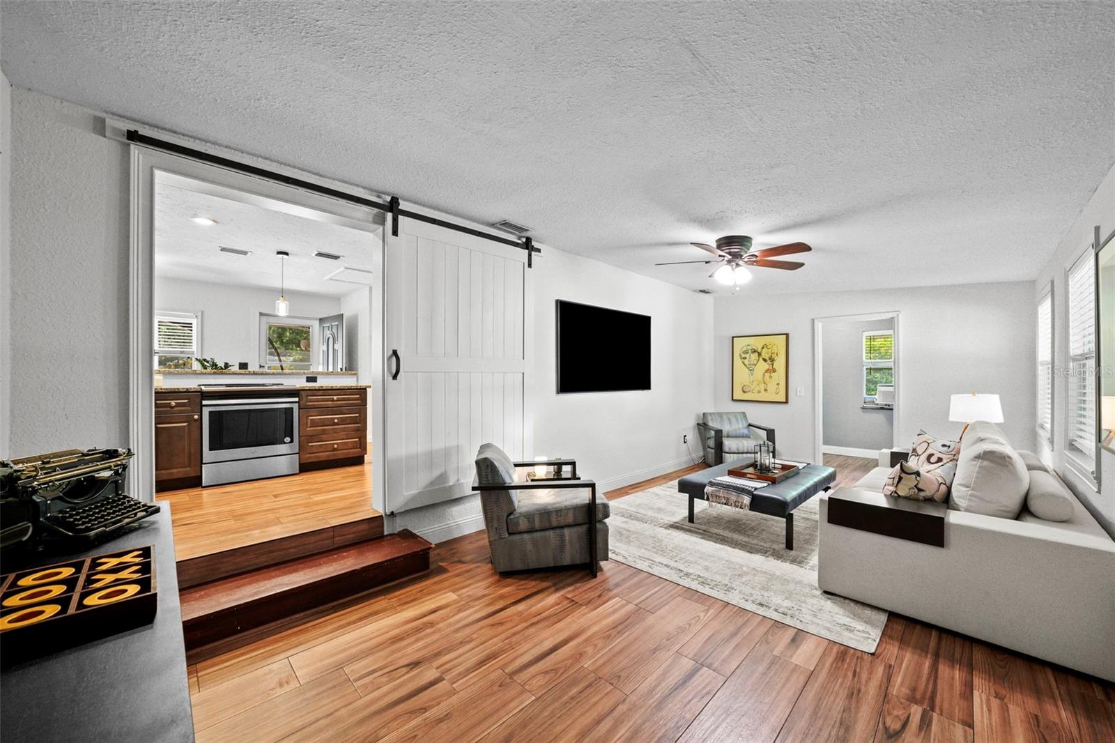 Large family room that can be closed off with the barn style door