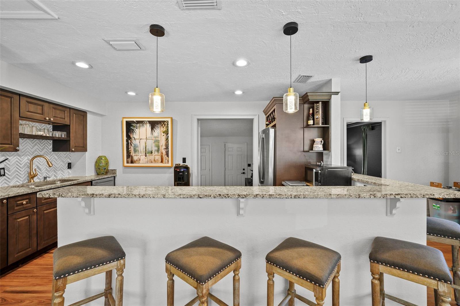 Plenty of bar seating and counter space for cooking, eating, and entertaining!