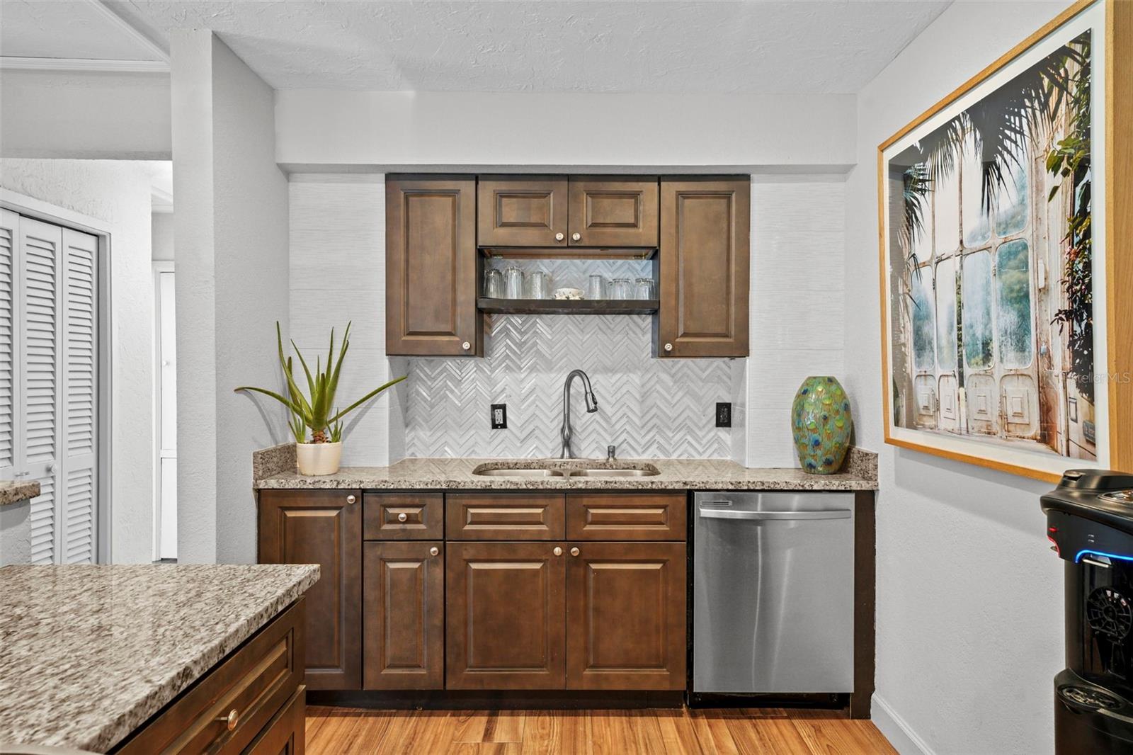 Additional display shelf for convenience and decor!  Plenty of cabinets for all your cooking needs.