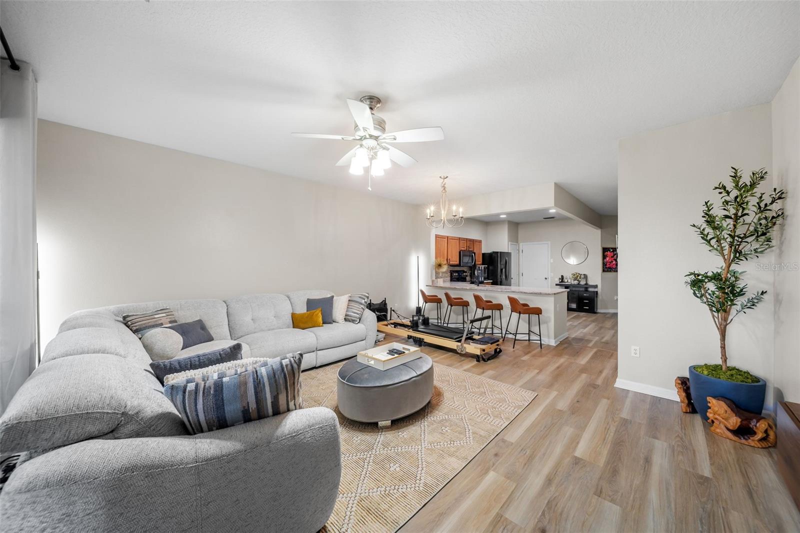 view of living area to dining and kitchen