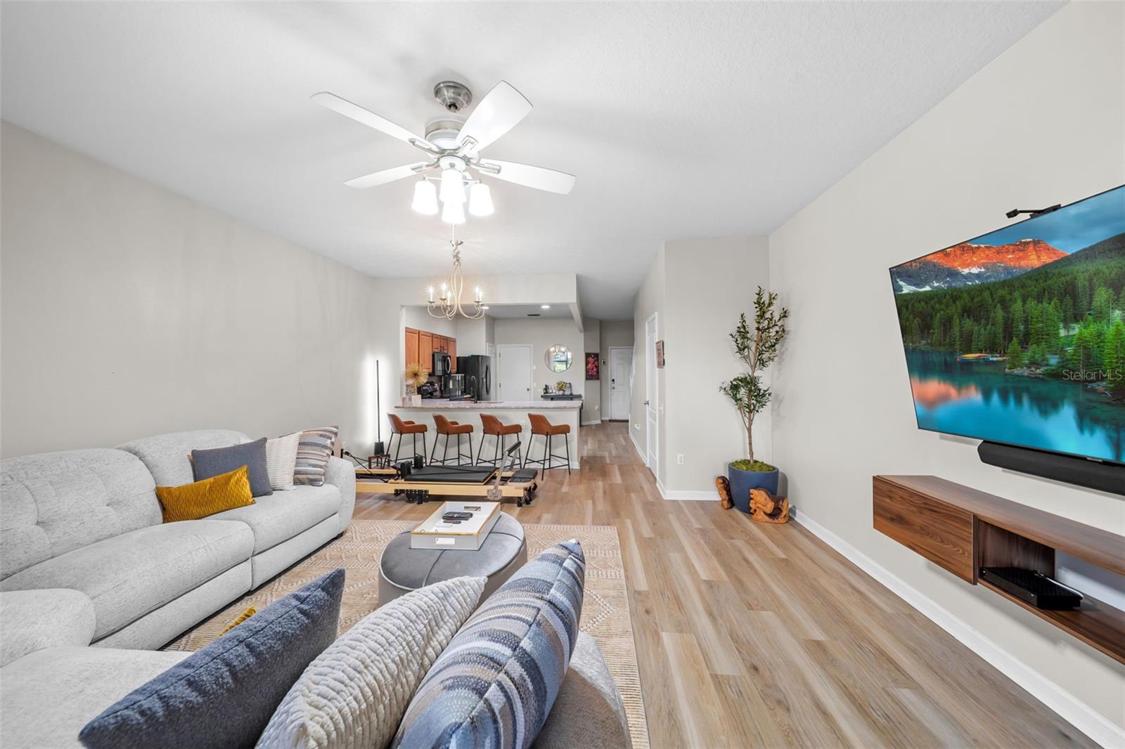 view of living area to dining and kitchen