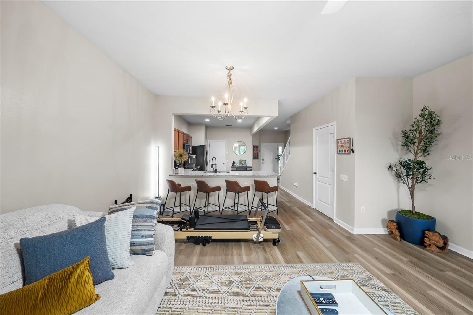 view of living area to dining and kitchen