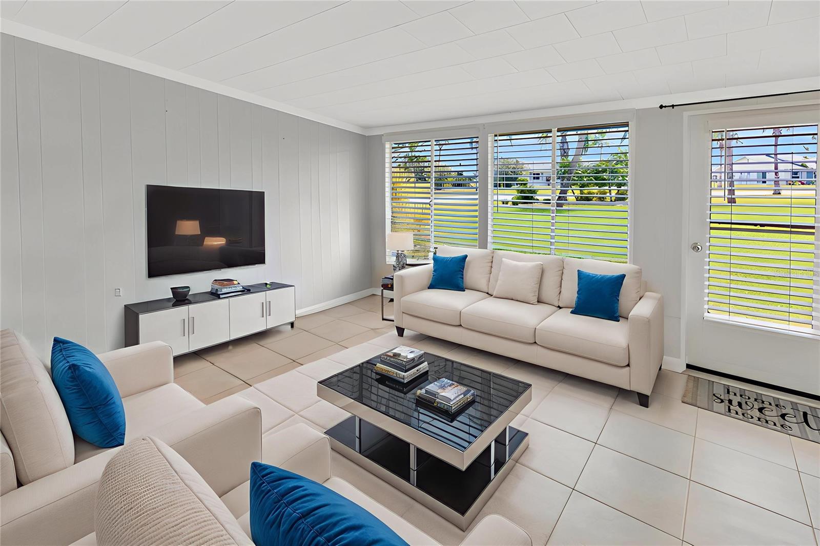 Visually Stagedas Sun Room/Family room