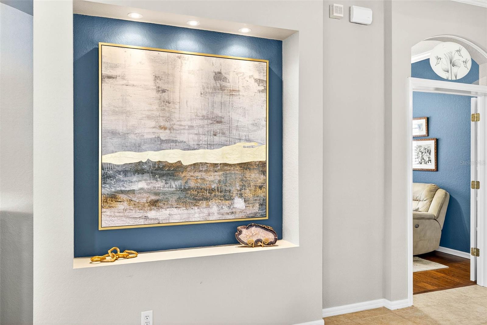 Great Room Art Niche and Doorway to Den