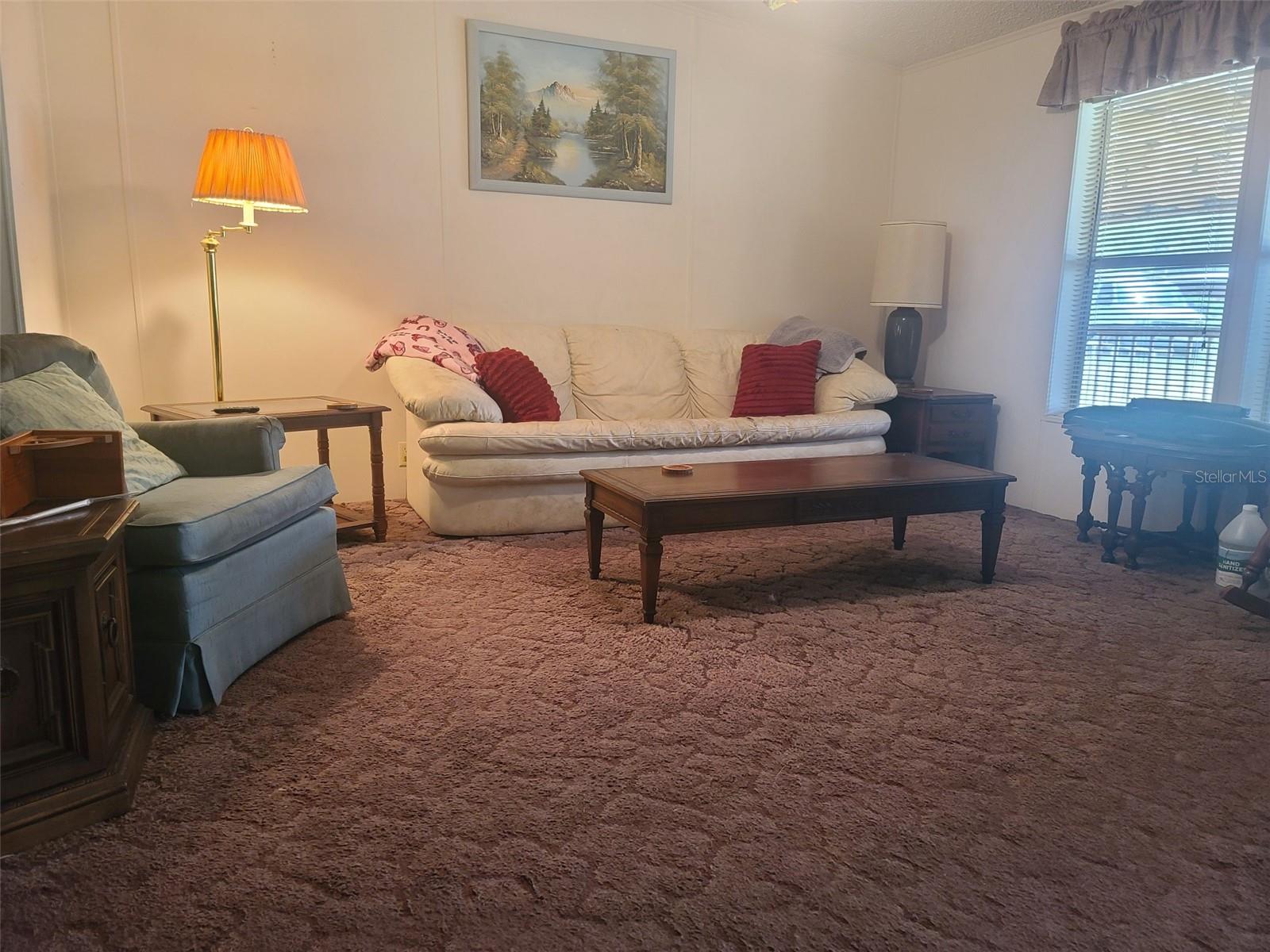 Large LR off Front Screened Porch.