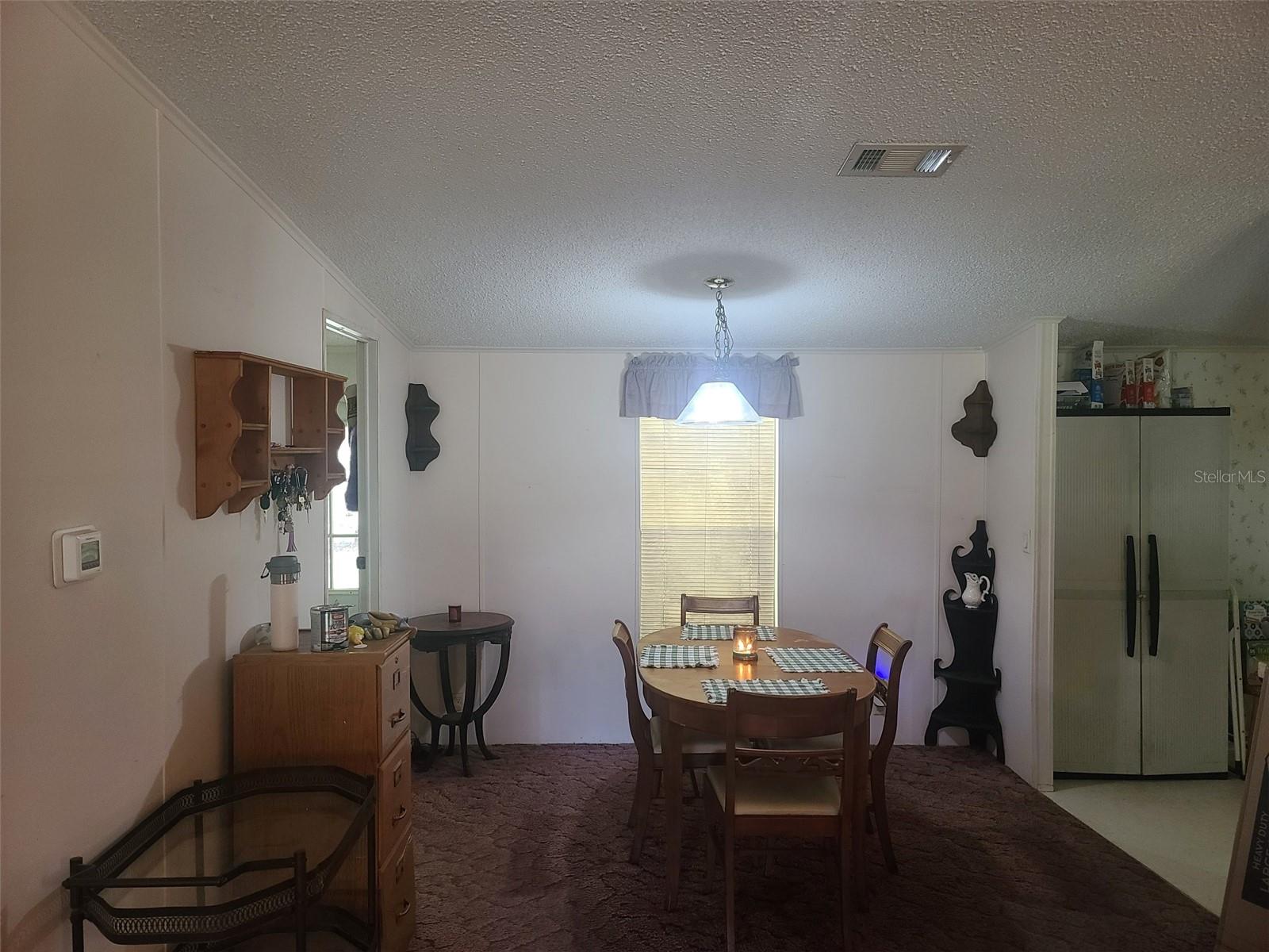 Formal DR off Kitchen...Laundry Room to left with back door to Carport