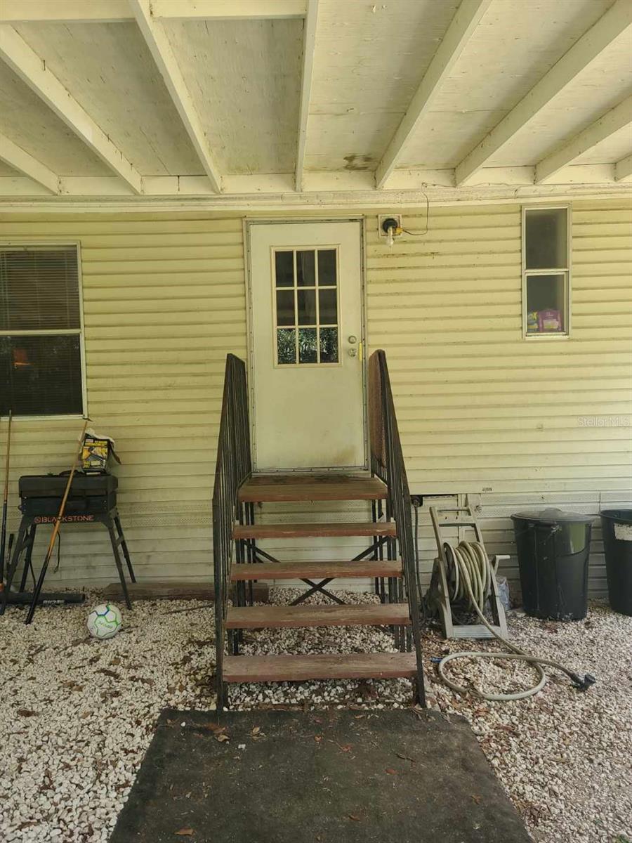 Carport off Back Porch and Laundry Room