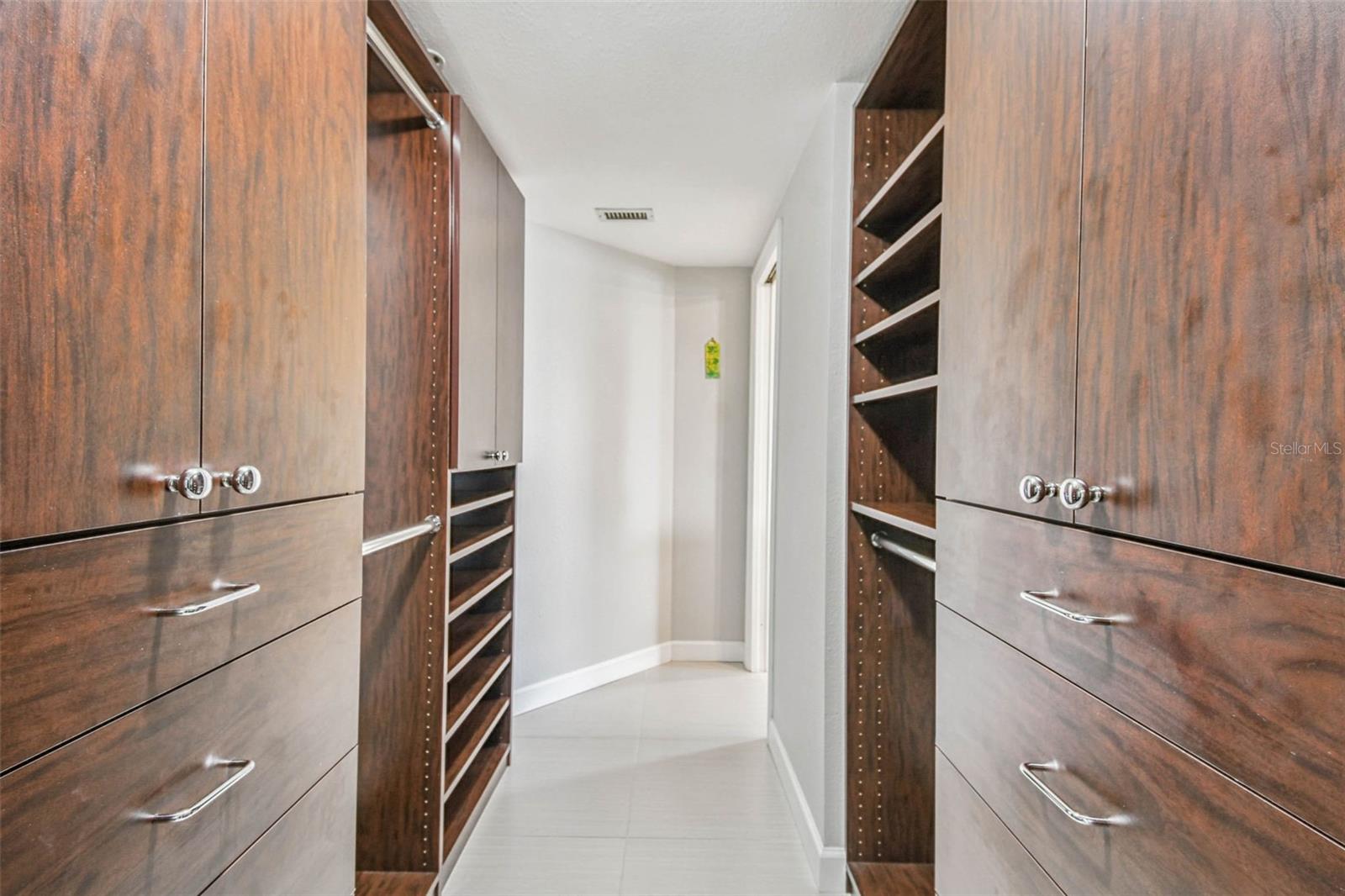 Primary Walk in Custom Closet