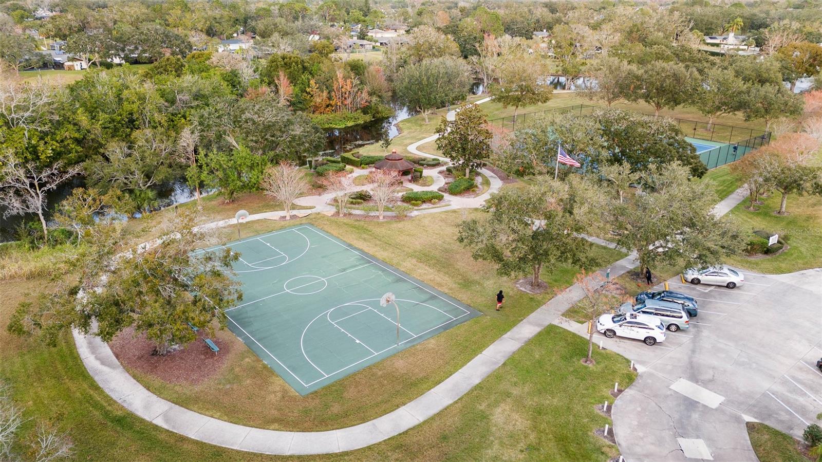 Carrollwood village basketball and tennis courts plus Playground