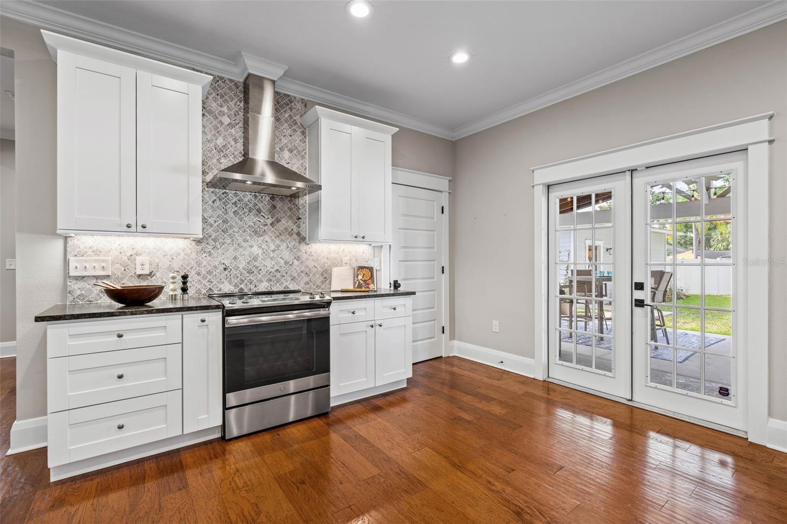 Kitchen Area Opens Out to Covered Back Lanai