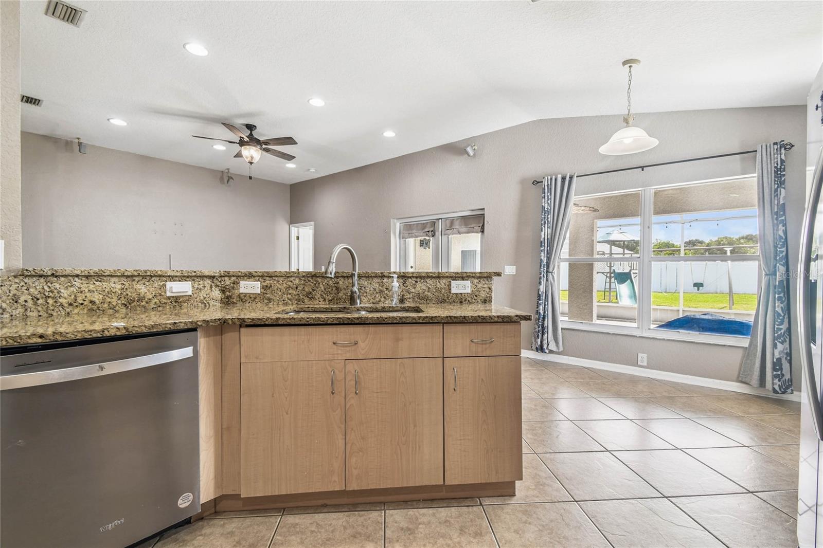 Easy to keep an eye out on your kids while in the kitchen with these over sized windows!