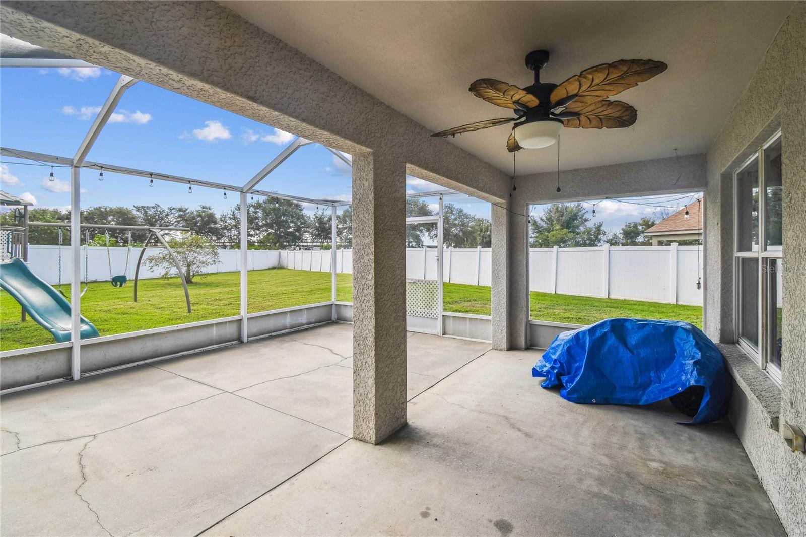 Screened in lanai porch.  Great for family barbecues and outdoor entertaining.