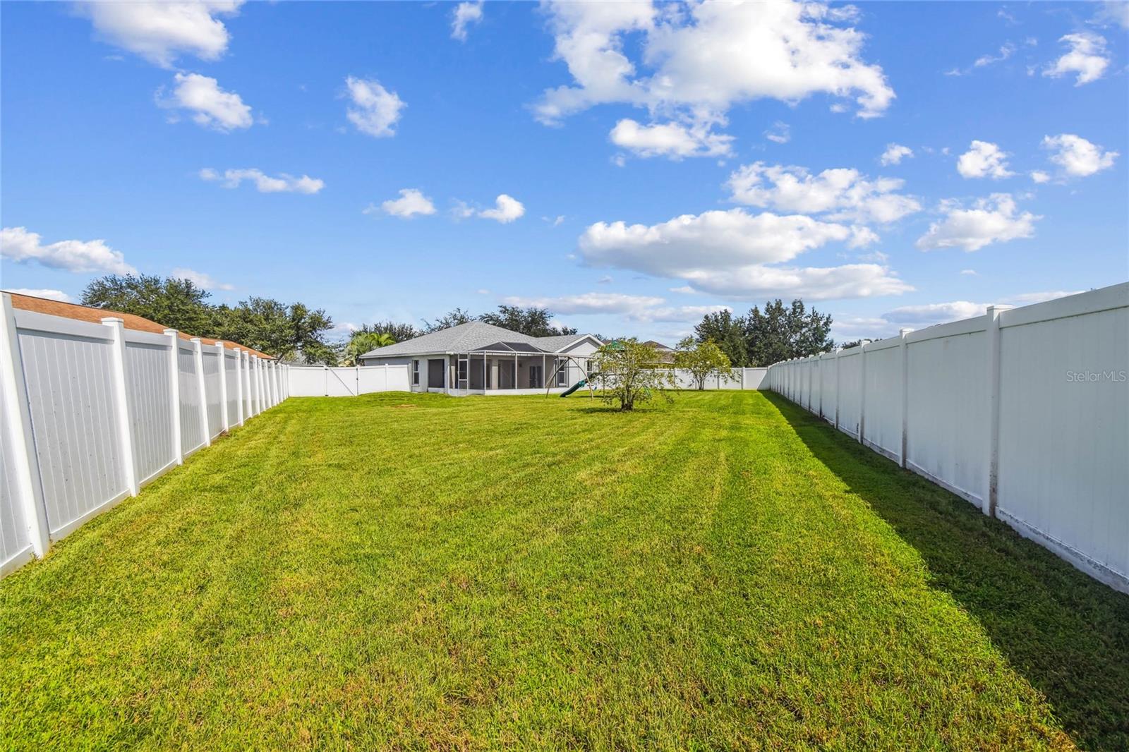 Backyard is fully fenced in for privacy and security.