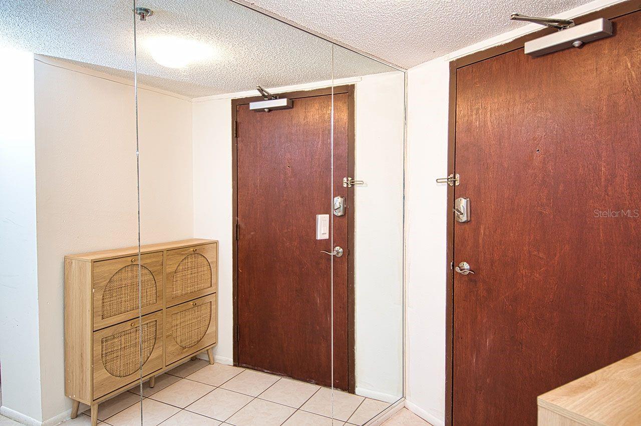 Welcome to Unit 804 with its open foyer and hallway to main living quarters.