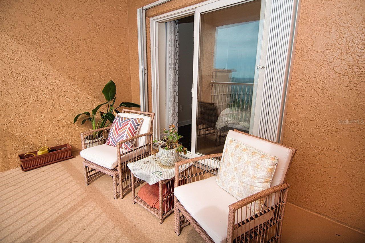 Private Master Suite balcony.   Complete with full protective Storm Shutters