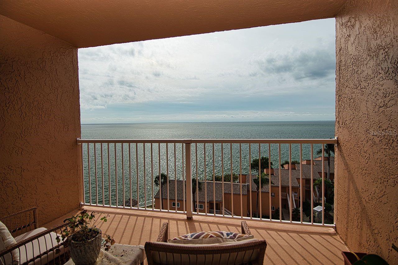 A ROOM WITH A VIEW!!  Imagine sipping your morning coffee and starting your day with the quiet calm of the sparkling bay waters from your Private Master Suite balcony.