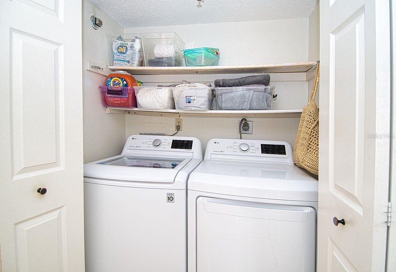 Inside Laundry closet accomodates full size washer and dryer.
