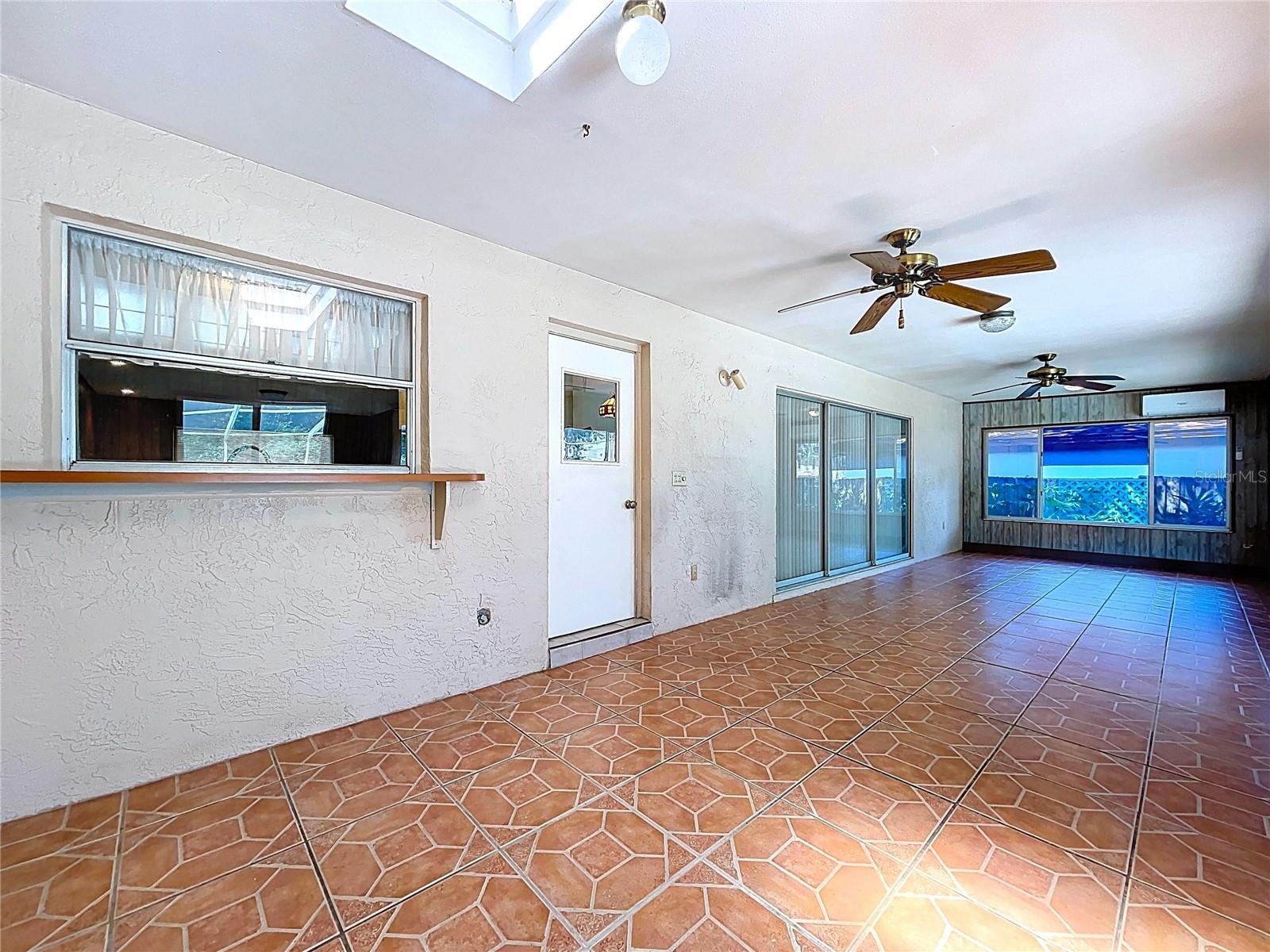 Kitchen pass thru window to Florida Rm