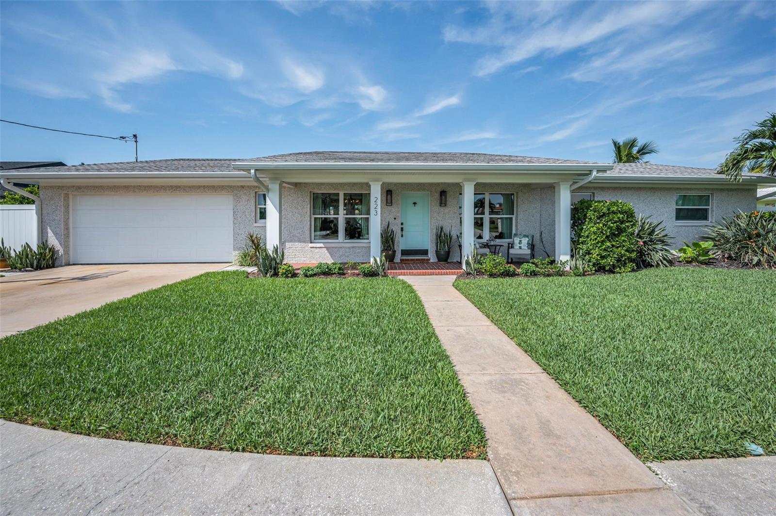Welcome to 223 Howard Drive in the highly desirable Belleair Beach!