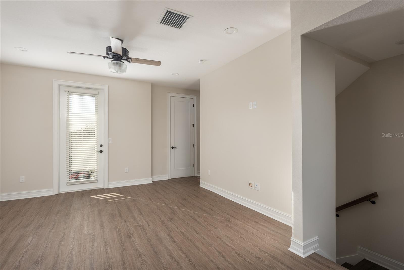 Living room to balcony and guest bath