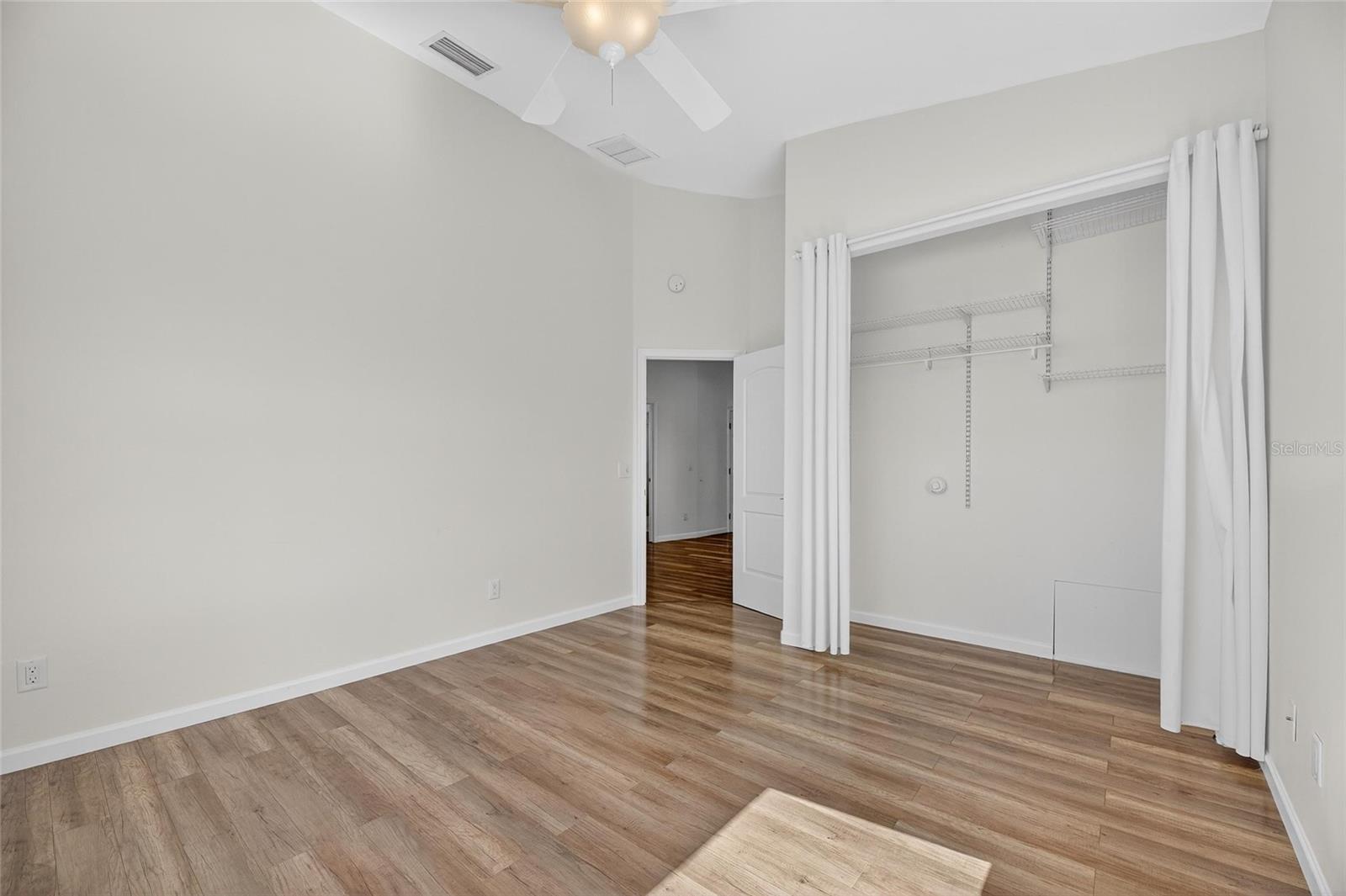 Second bedroom offers a large closet for family or guests to settle in.