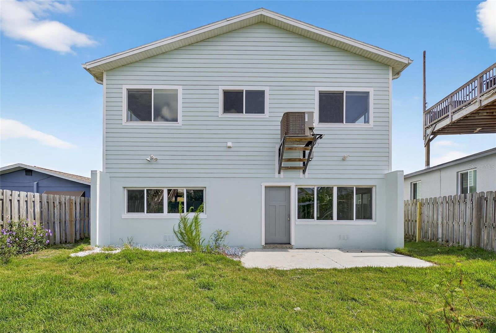 The fenced backyard is ready for your%2