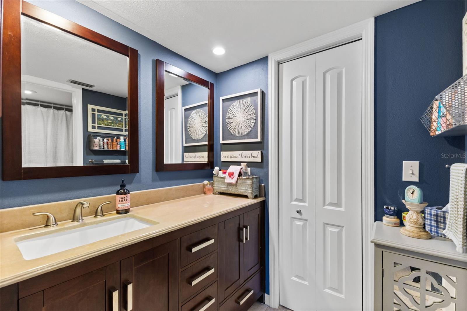 Primary Bathroom with a linen closet.
