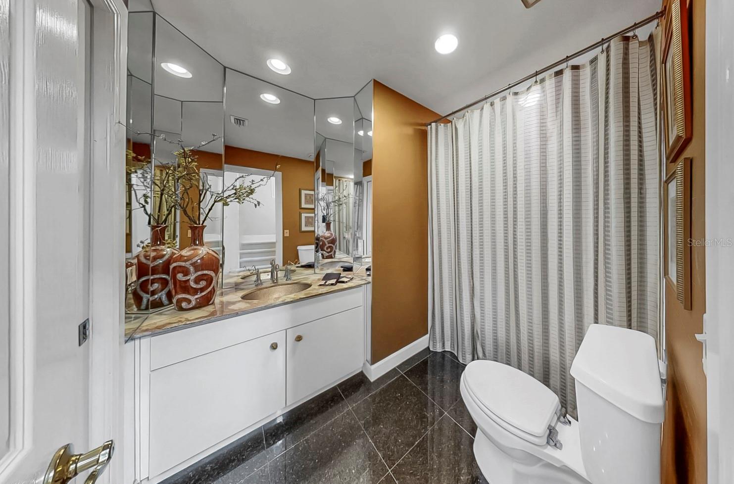Bathroom connected to the Office/Den/and Foyer