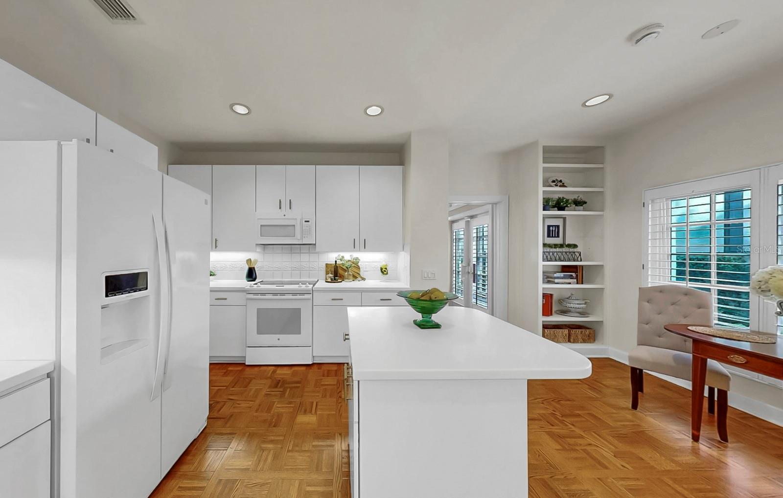 Kitchen with view of breakfast nook