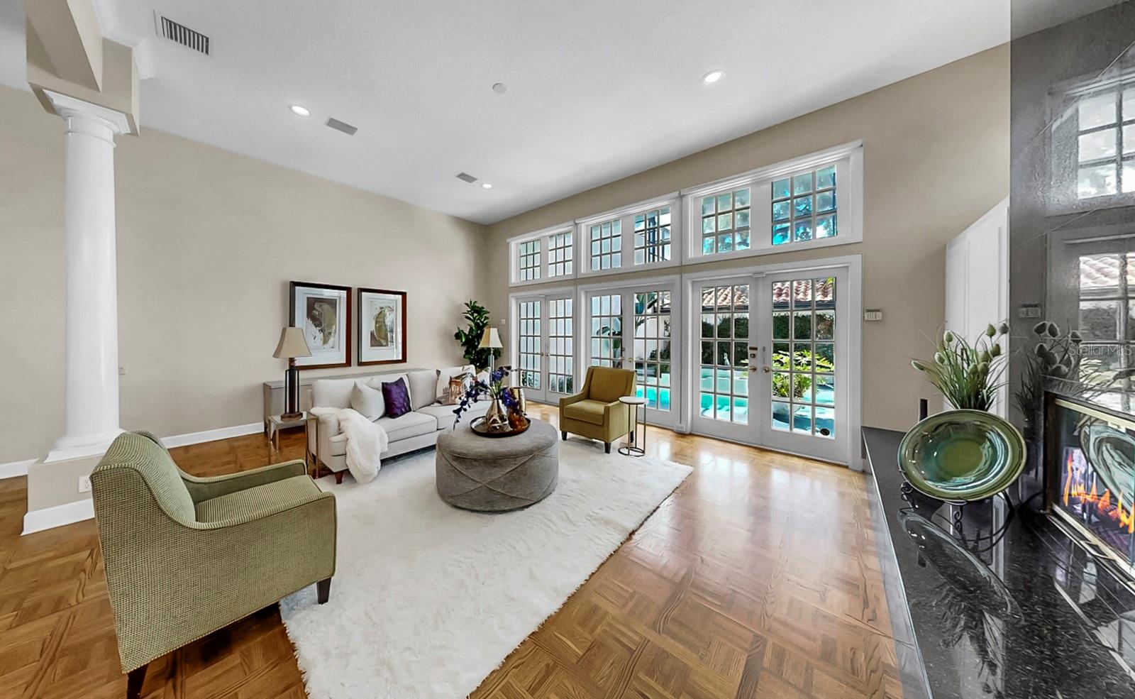 Living Room with view of pool/patio