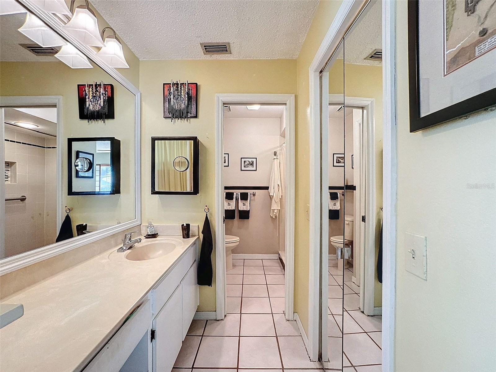 Step in shower in the owner's retreat ensuite bathroom