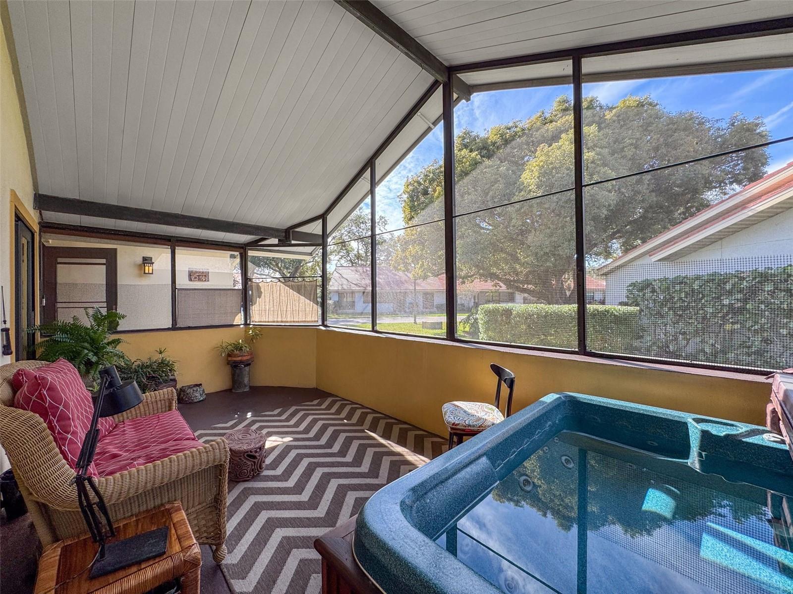 Side patio with hot tub