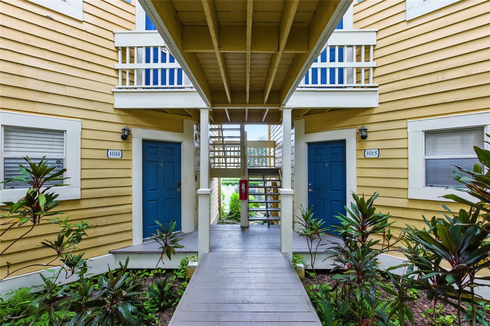 Each building has its own cozy courtyard-style entry — tucked and neighborly