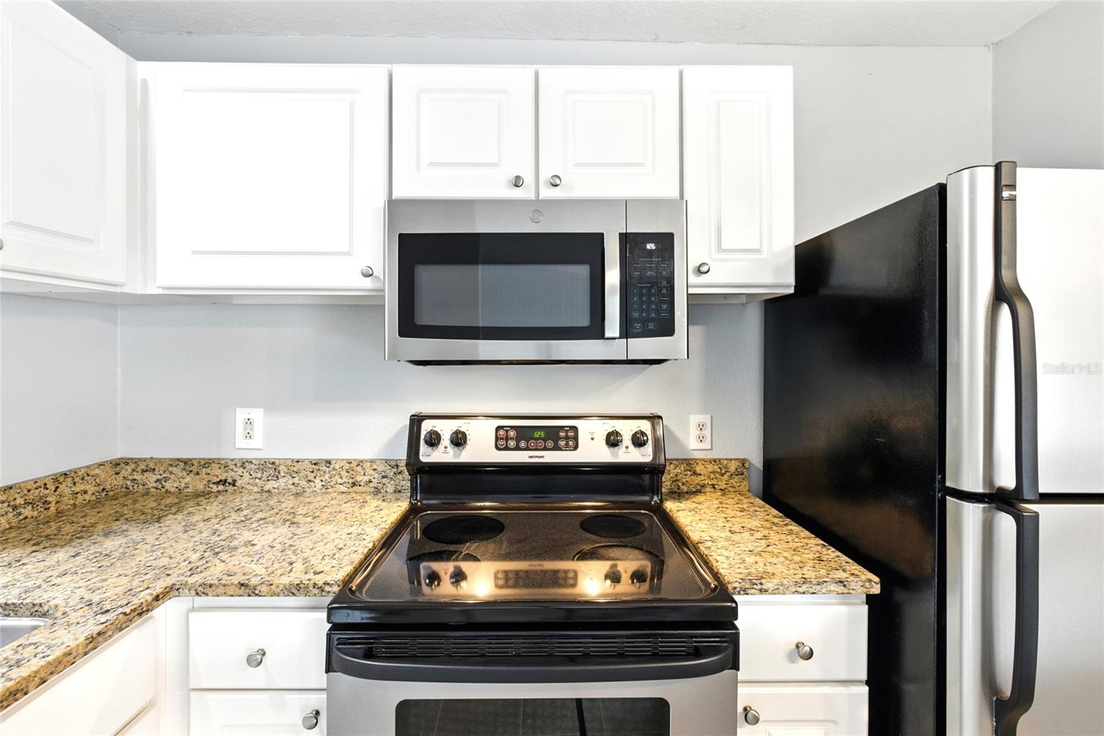 Granite countertops, stainless steel appliances, and a functional layout