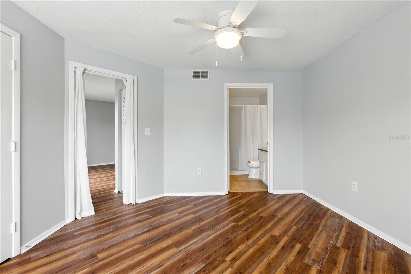 Large, bright, primary bedroom with en suite bath