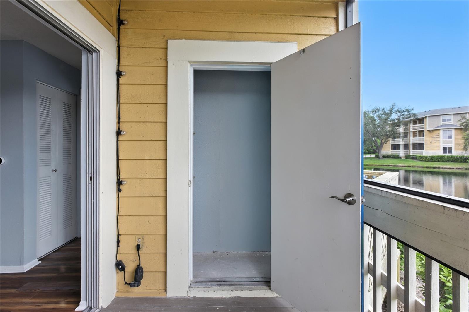 Additional storage closet on the porch provides convenience without taking away from living space