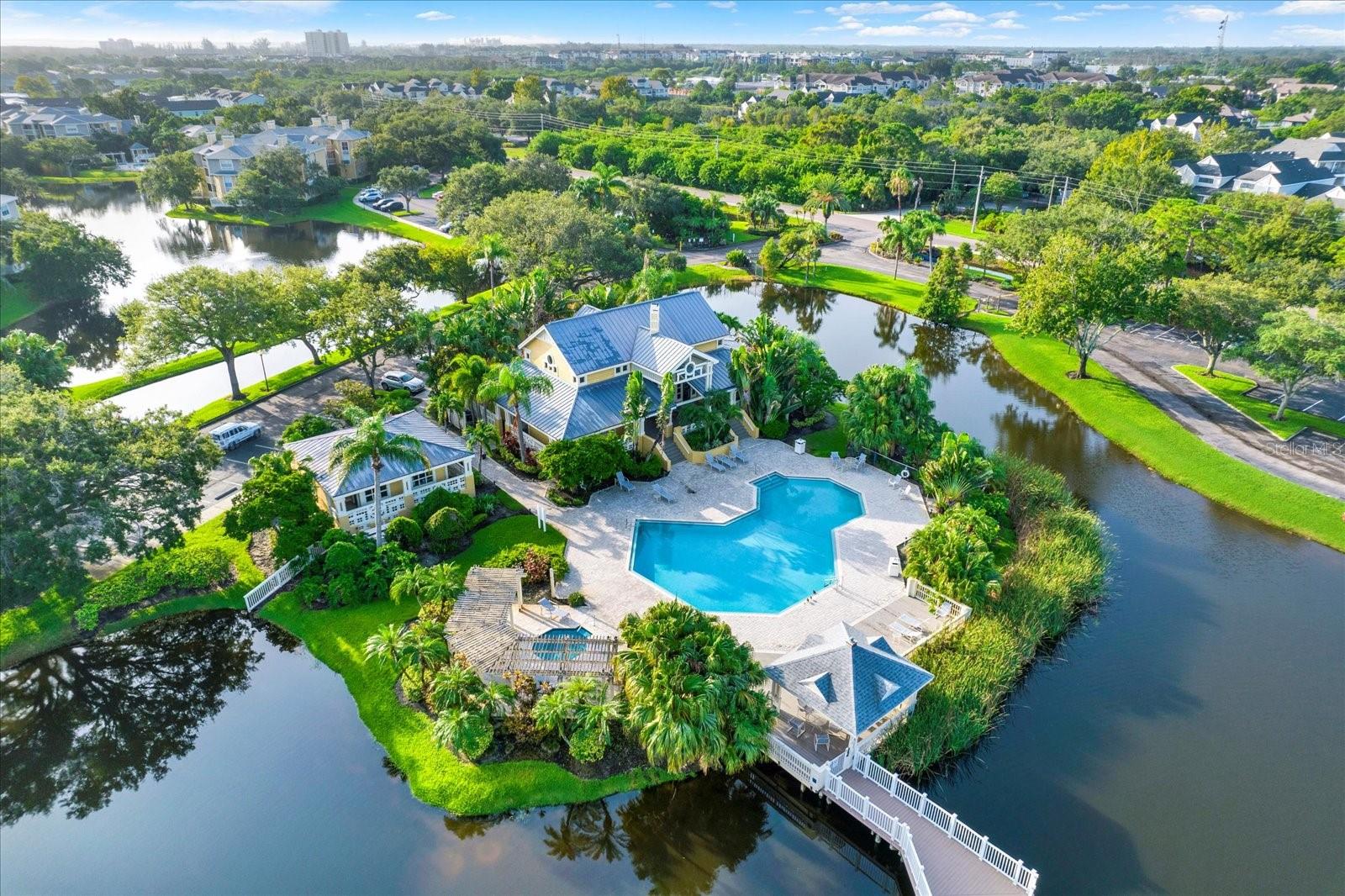 One of TWO pools — with a clubhouse that looks like it belongs on vacation.