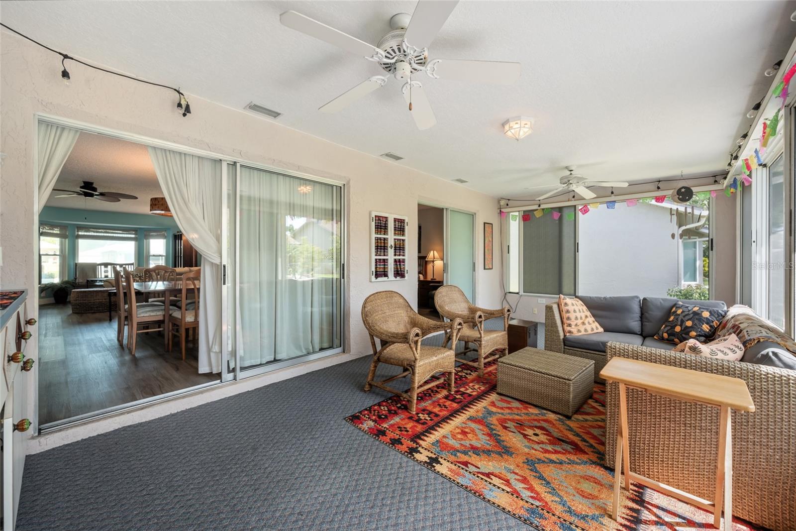 Heated and cooled screened-in porch.