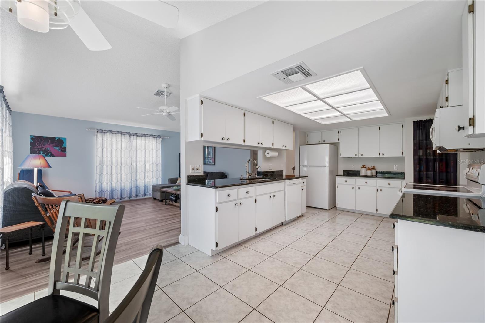 Spacious kitchen with room for dining.