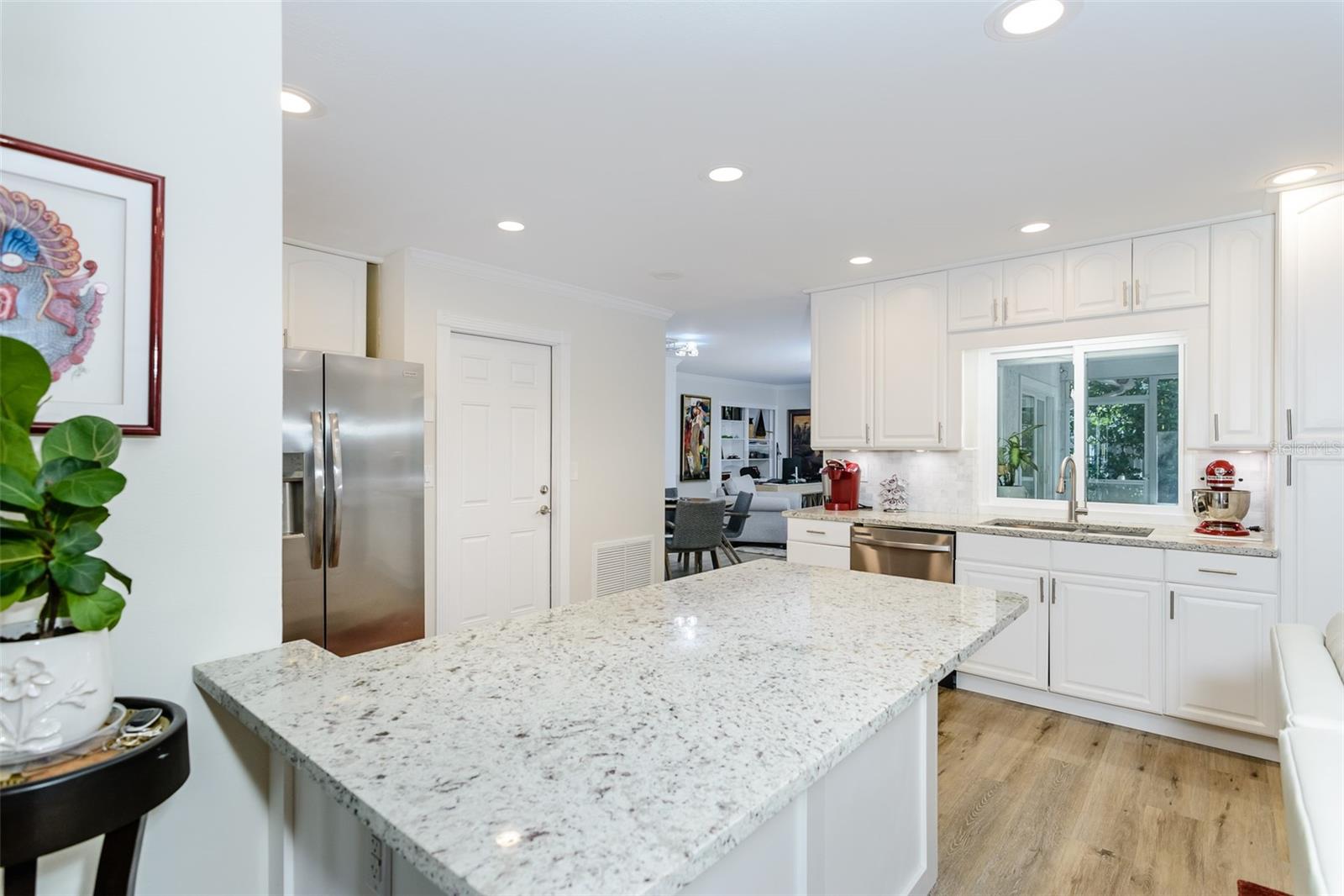 Quartz countertops and luxury vinyl flooring.