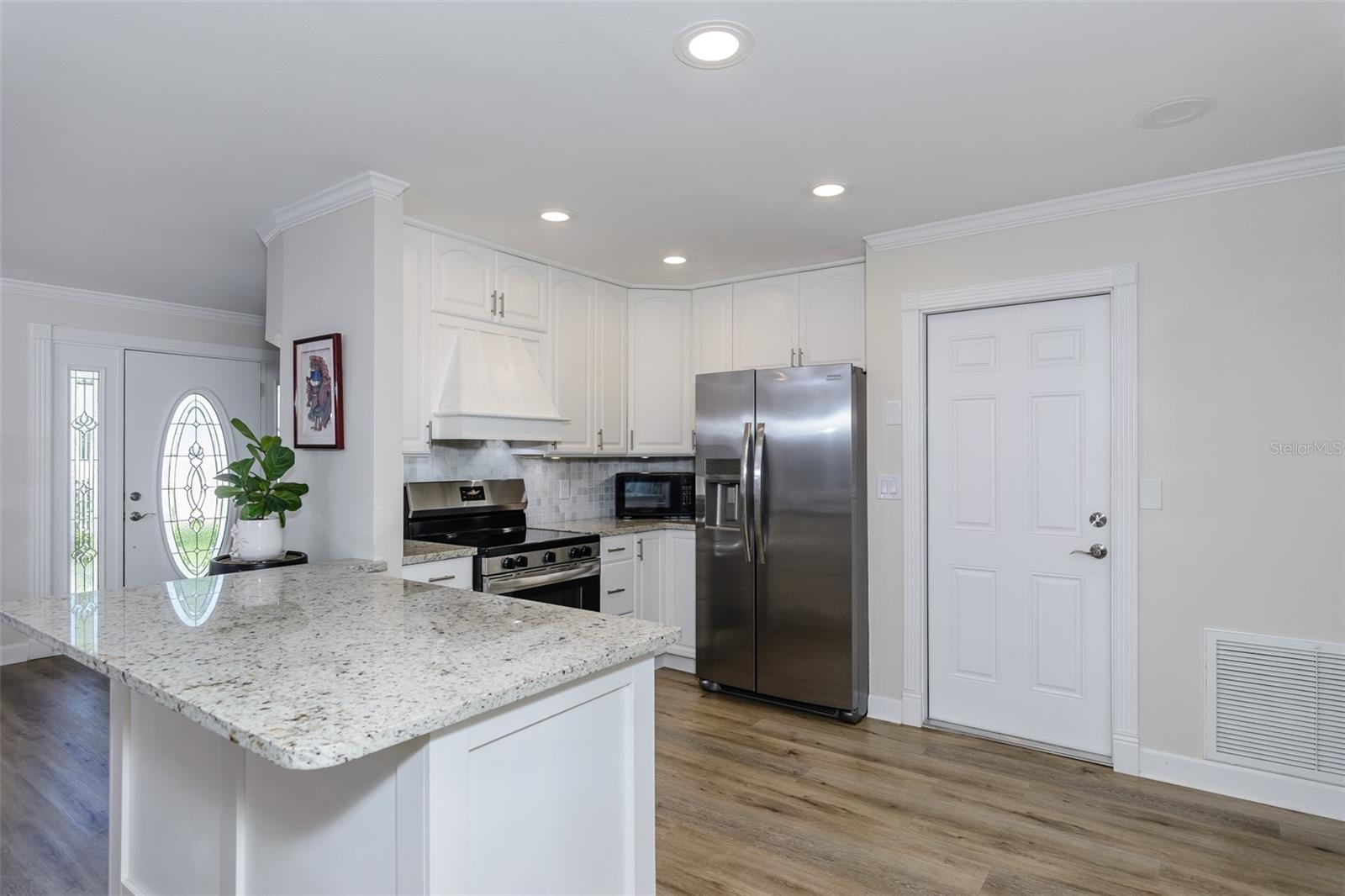 New stainless range and refrigerator in 2025.
