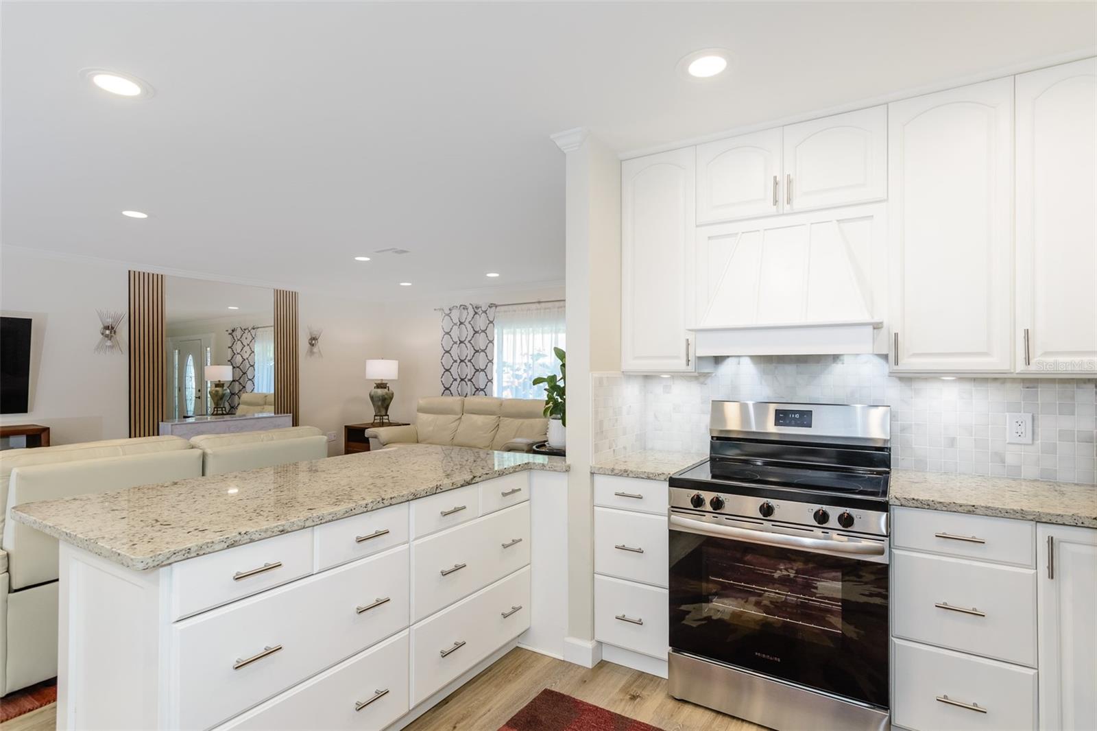 Kitchen opens to the living room