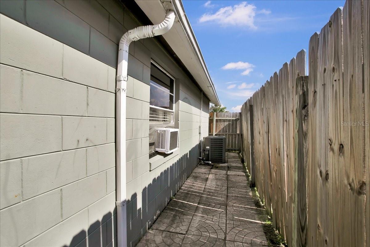 side of home where AC access is located