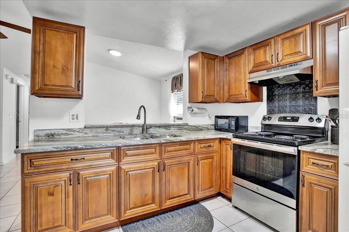 kitchen with window to dining room