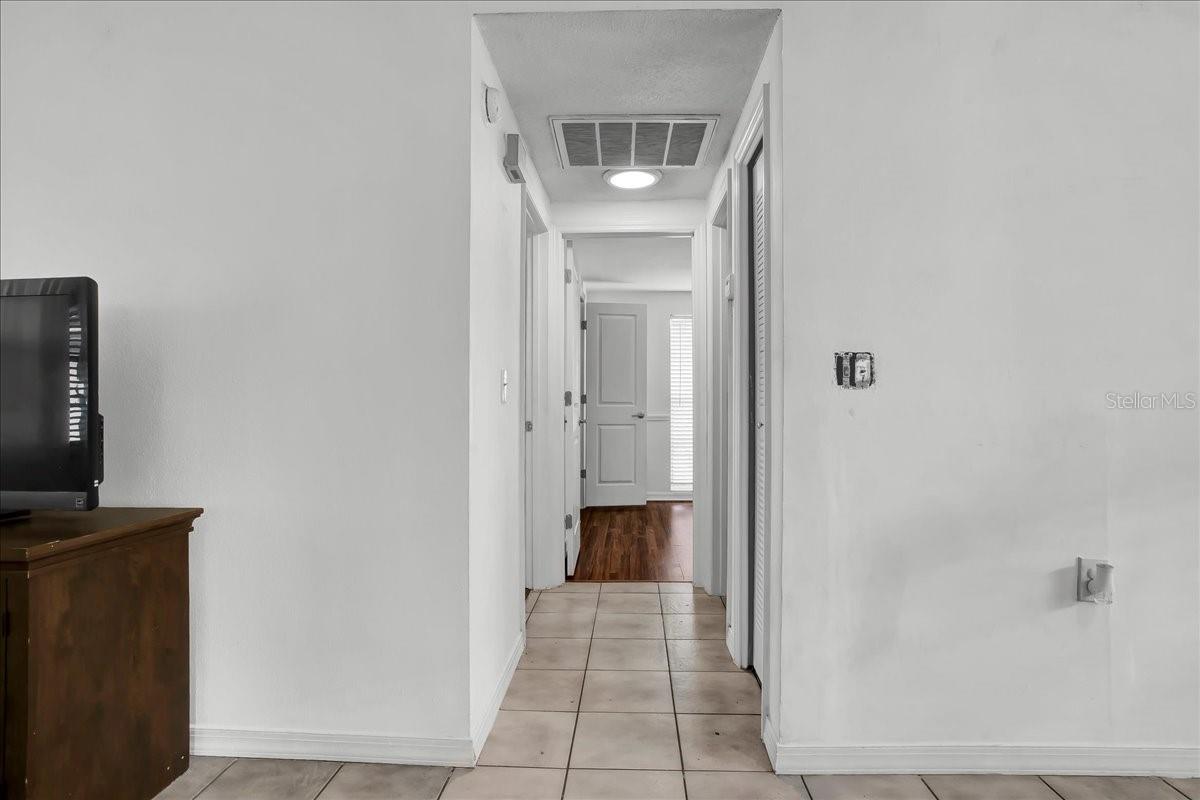 hallway to bedrooms and second bathroom