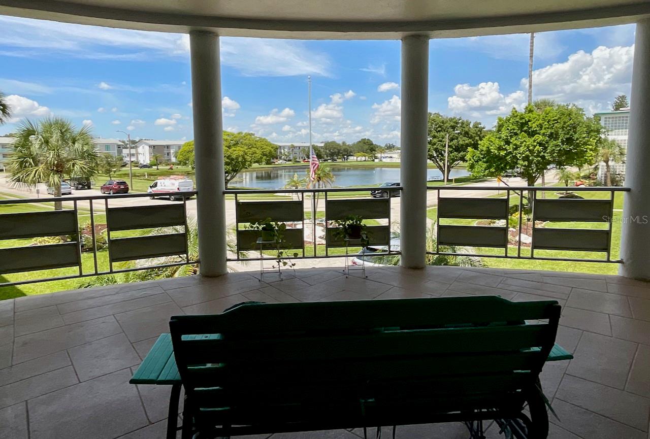 2-Front covered, shared porch area view.