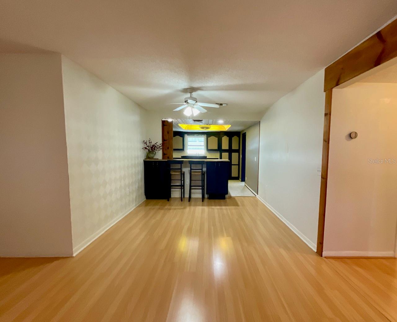 8-Living room open to dining area and kitchen