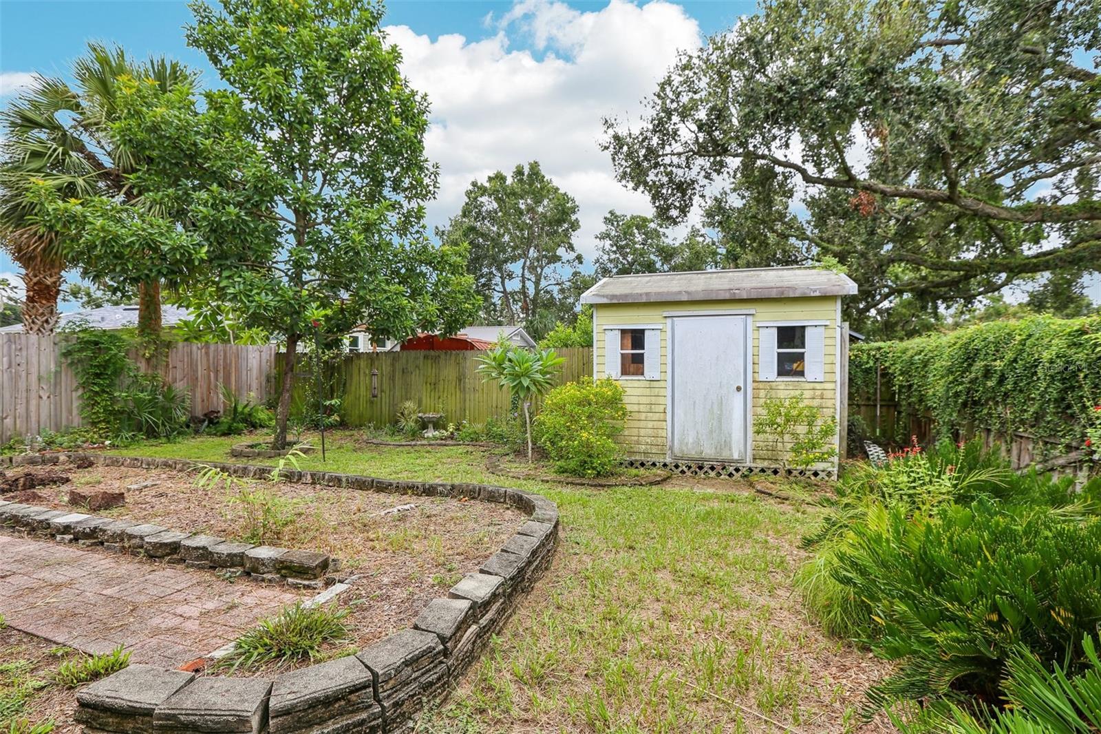 Fenced Back yard and Shed